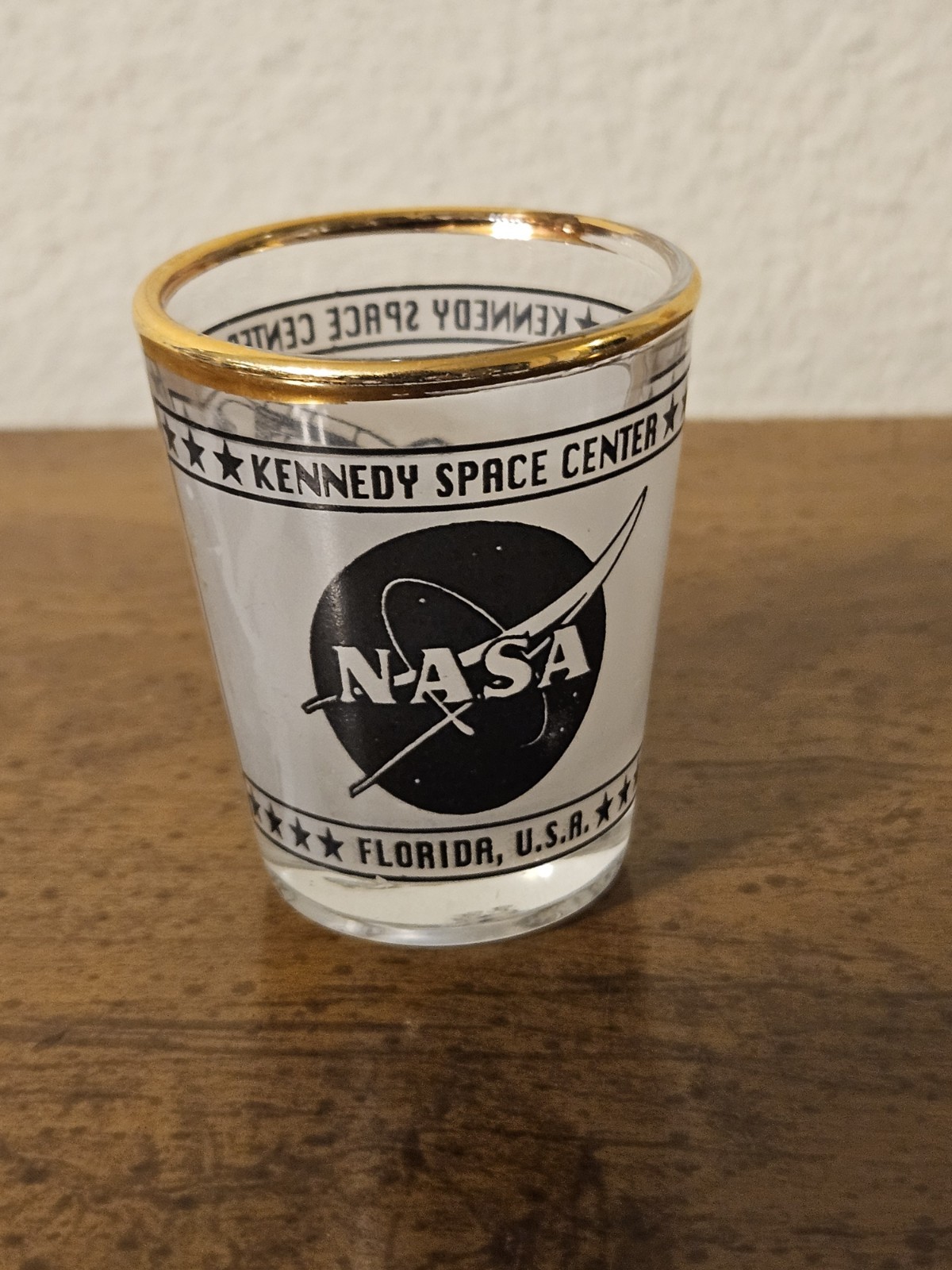 NASA Kennedy Space Center Metallic Gold Rimmed 1.5oz Shot Glass 2"x2"