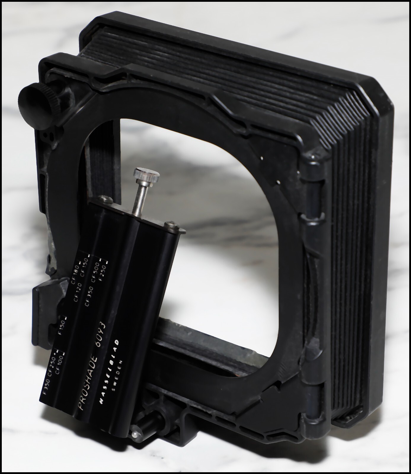 Hasselblad ProShade 6093. Functionally great condition, cosmetically fair.