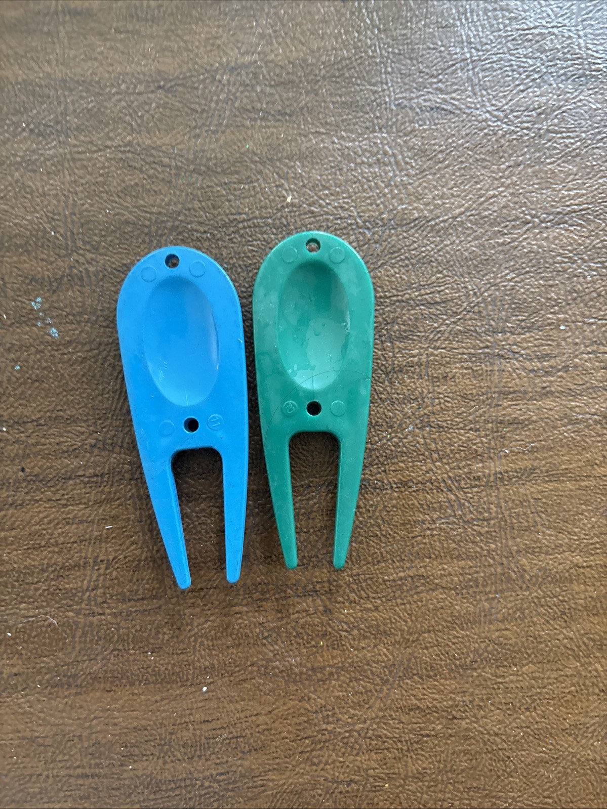Tees, Ball Markers ,And Divit Repair Tool