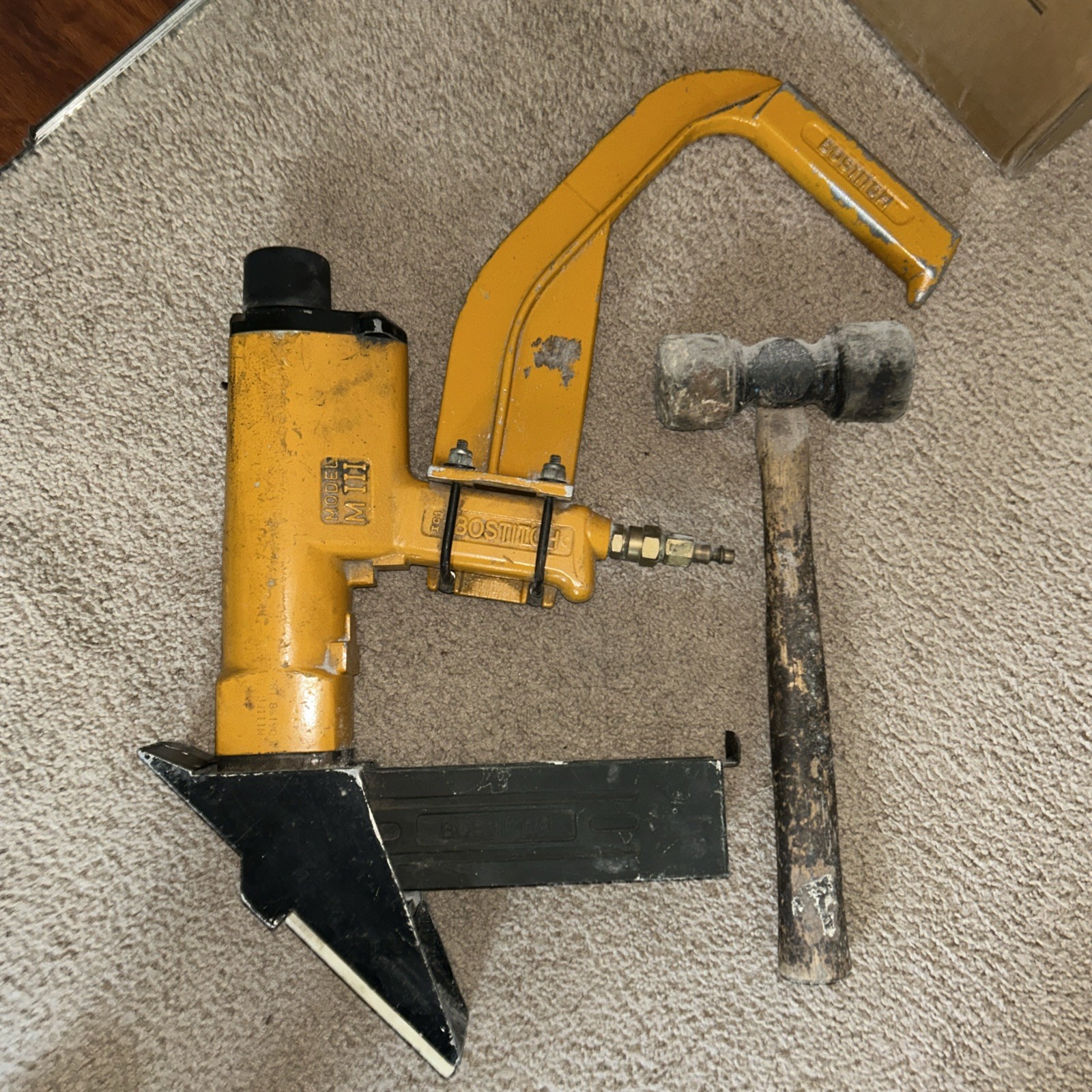 Bostish model M111 Air Powered hardwood flooring stapler. With Mallet