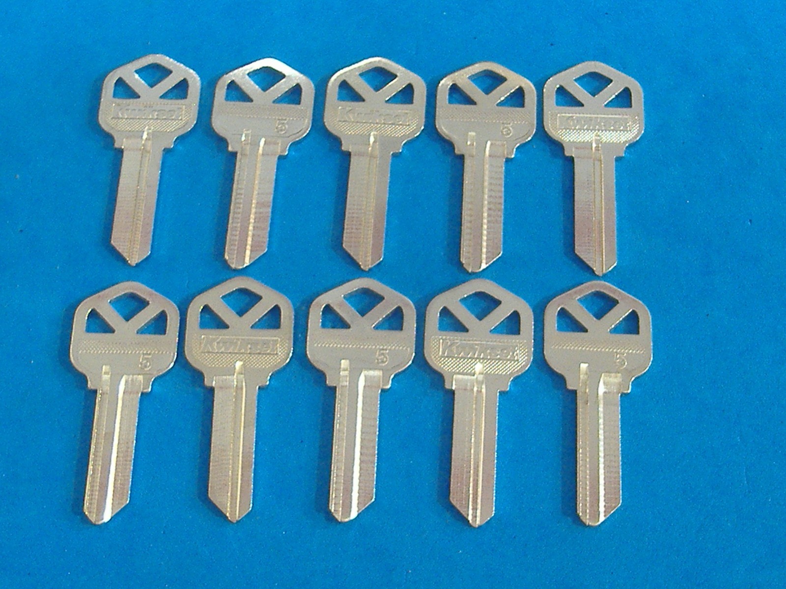 LOT OF TEN GENUINE KWIKSET NICKEL CHROME PLATED LOCKSMITH KW1 KEY BLANKS BLANK