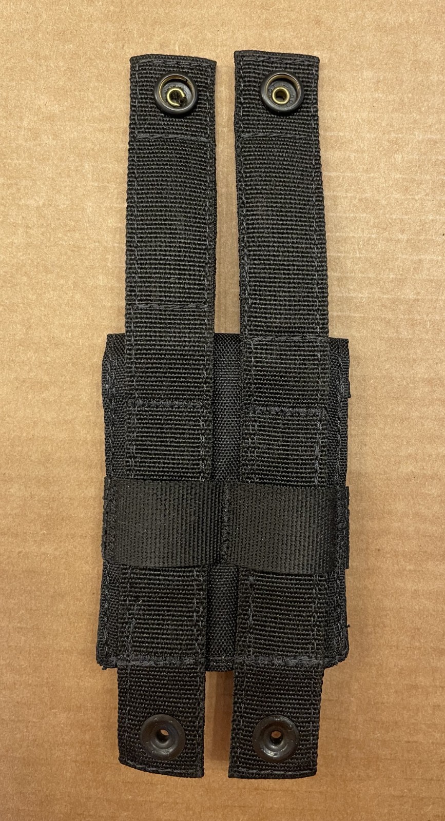 MOLLE handcuff/utility pouch, new approximately 4"x3"x1"