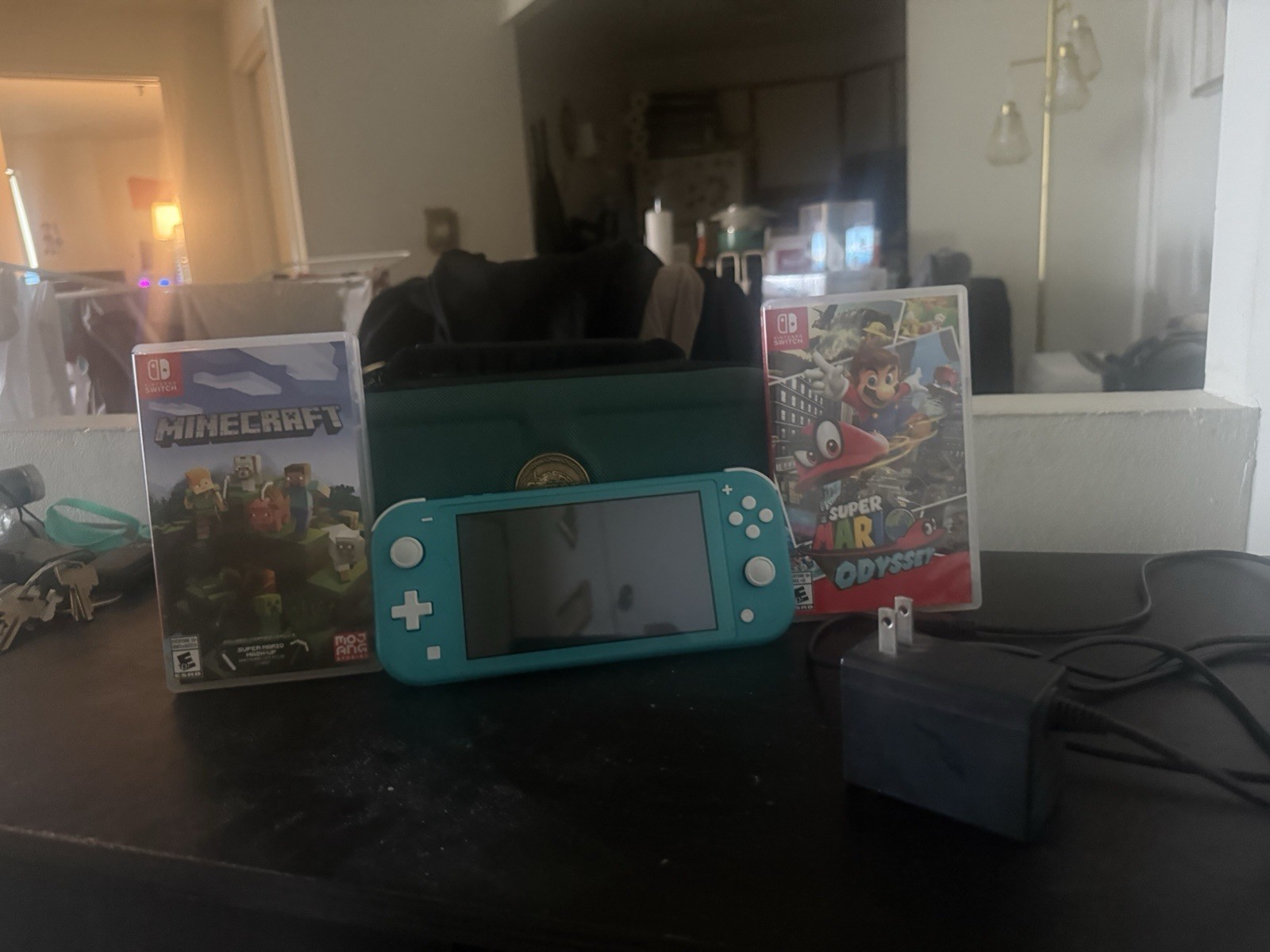 Nintendo Switch Lite Turquoise Bundle w/ Case, Adapter Minecraft & Mario Odyssey