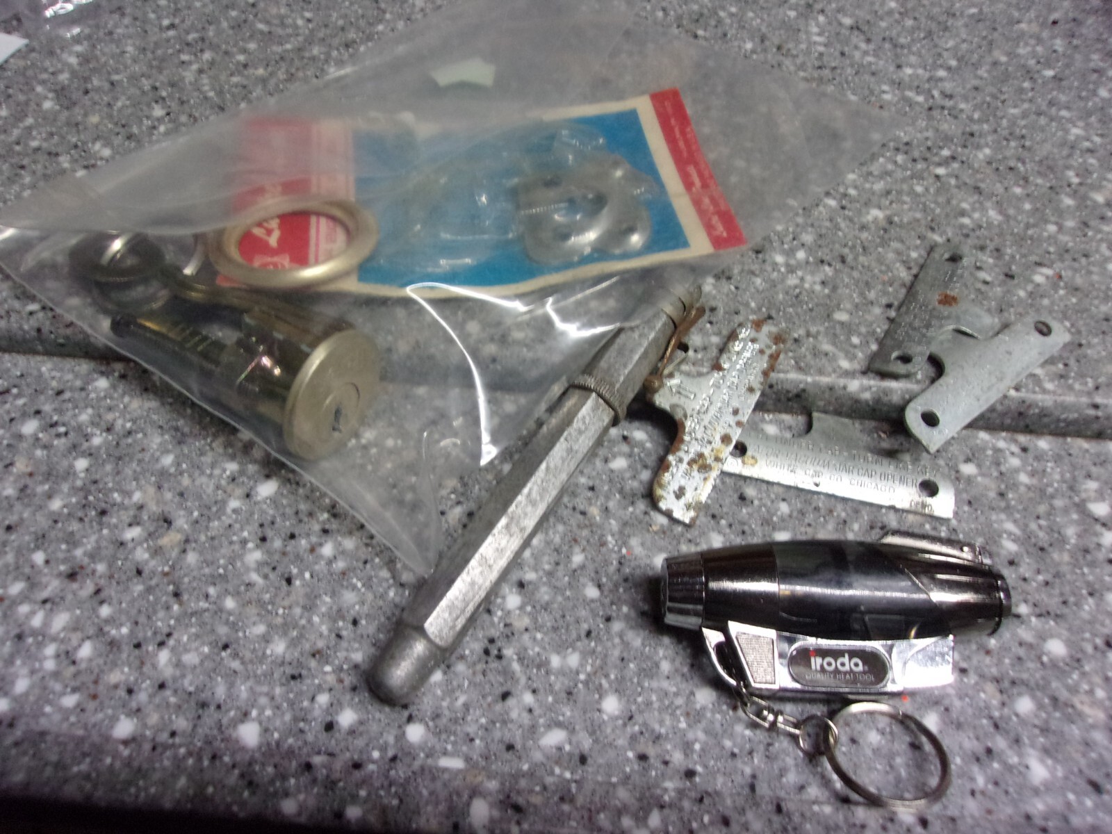 T11  misc older things lock set ODD pen marker ? can openers ipod heat tool