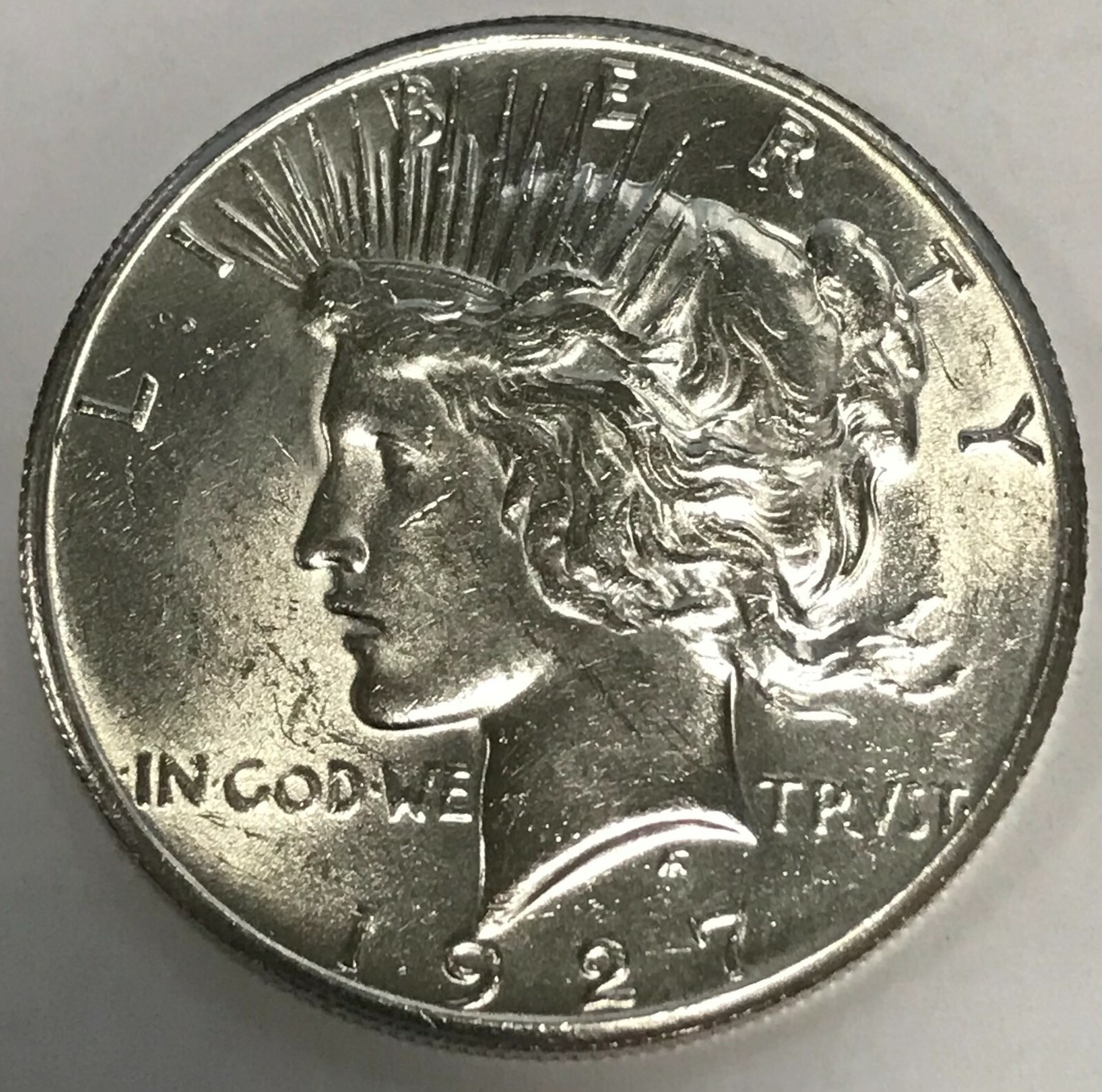 1927-p Peace Silver Dollar.  B.U.  85587   (Inventory A)