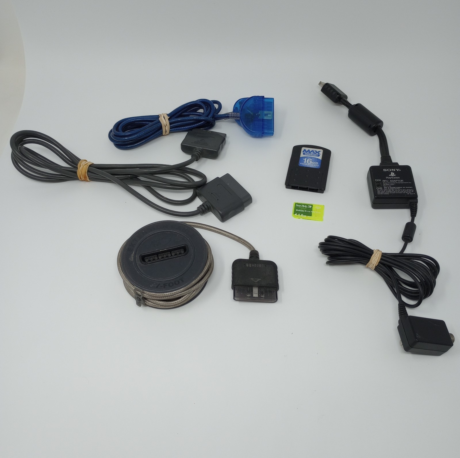 Playstation Accessory Lot (RFU Cable, 3 PS2 Controller Cables, & 2 Memory Cards)