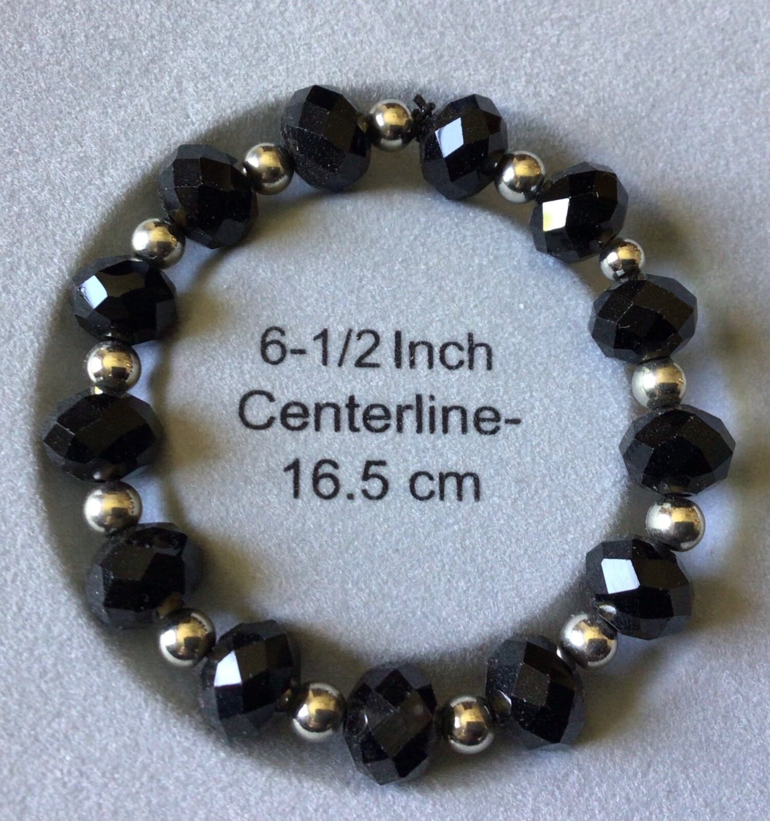 6.5" bracelet handmade with black and silver beads, Made in the USA