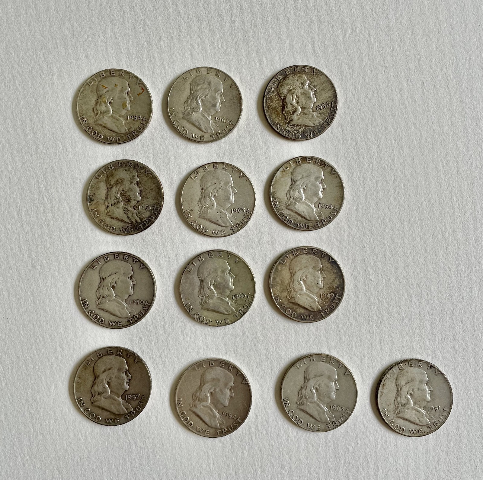 Lot of 13 Benjamin Franklin Half Dollar 90% silver Coins 1948-1963