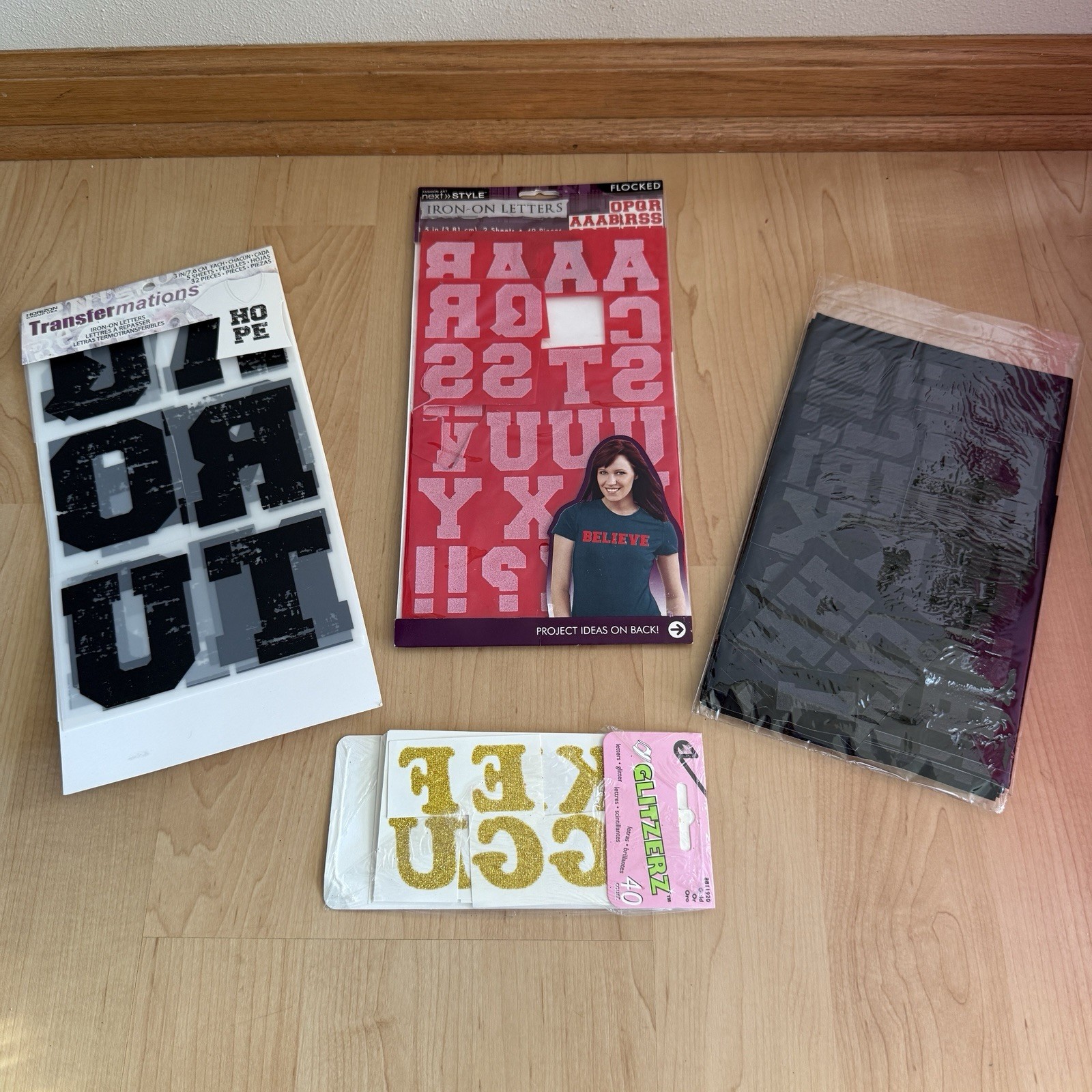 Lot of 4 Opened Packs of Iron-On Letters in Various Sizes, Fonts, Colors