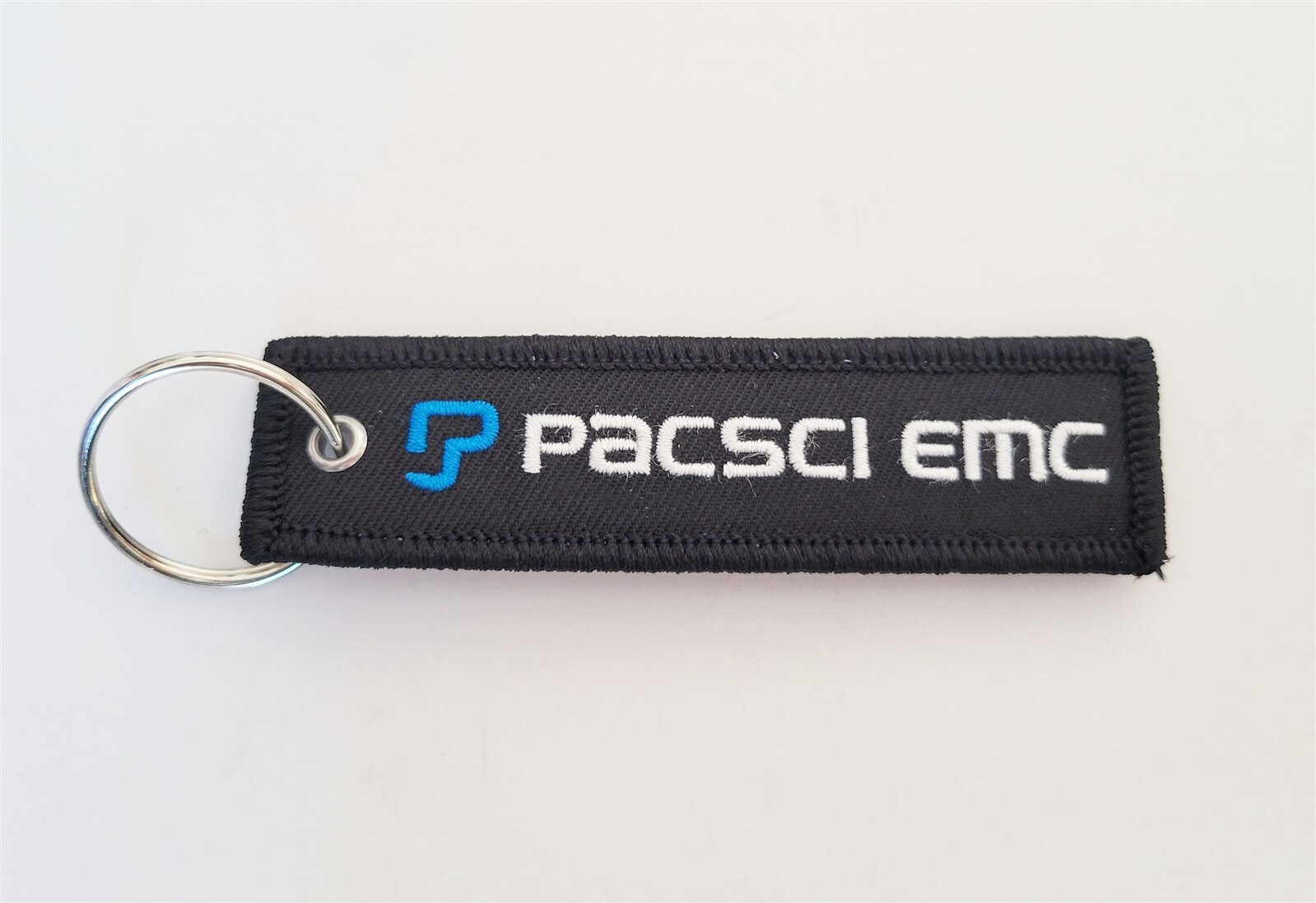 PacSci EMC Pyrotechnic & Energetic Material Solutions Black Keychain Military