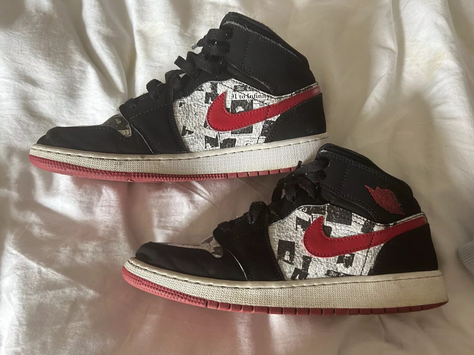 Nike mid SE Newspaper 7Y