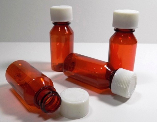 1 ounce graduated oval bottles & CR Caps-Case of 200 Pharmacy Grade-Special!!