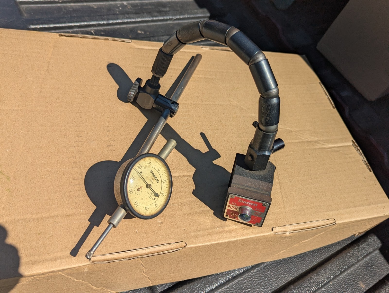 Starrett 657 magnetic base with Flex-O-Post And Ames 1" Travel Indicator.