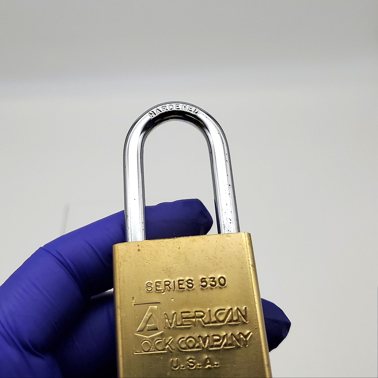 American 530 Padlock Rekeyable 1-5/8"L x 1/4"D Shackle 1-3/8" Brass Body No Core