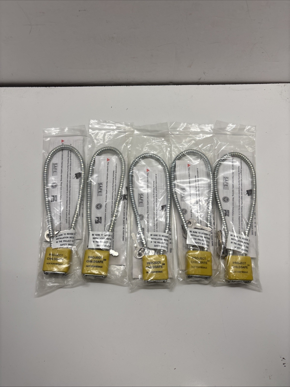 Lot of 4 Project Childsafe Gun Lock Bundle w/ Keys Silver Cable Style