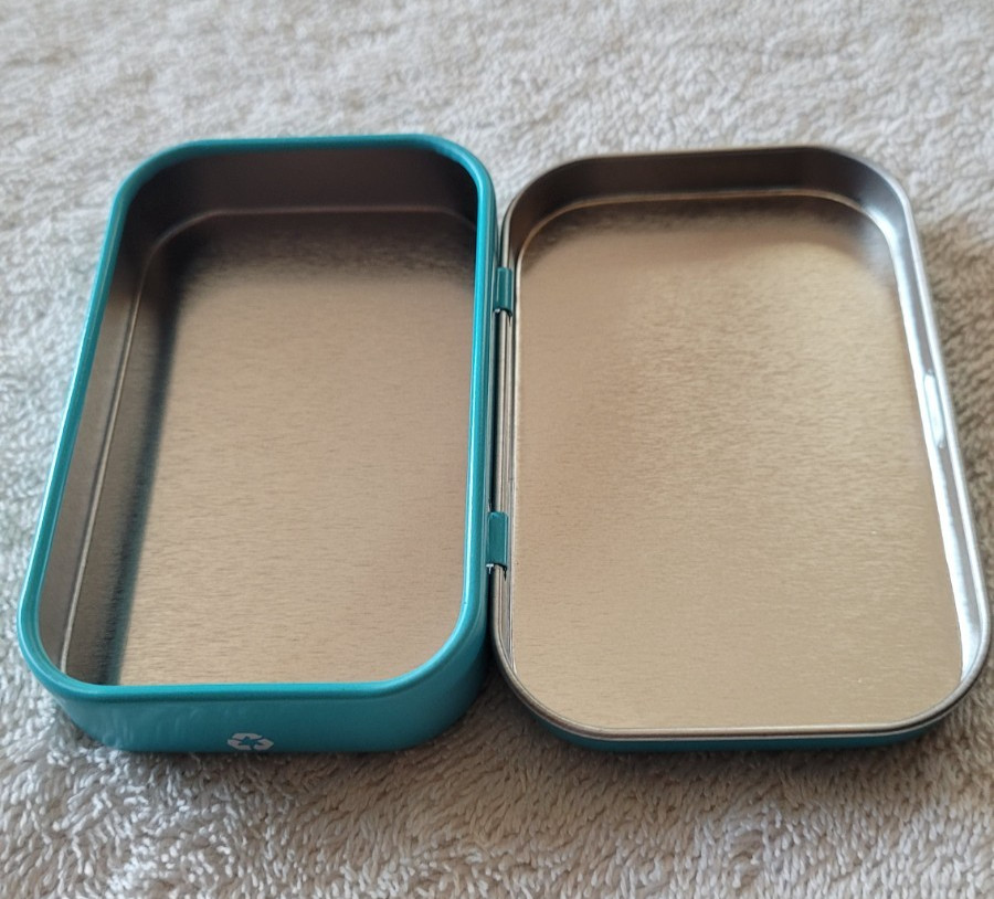 Preowned Wooble Wee Woobly Bits Tin