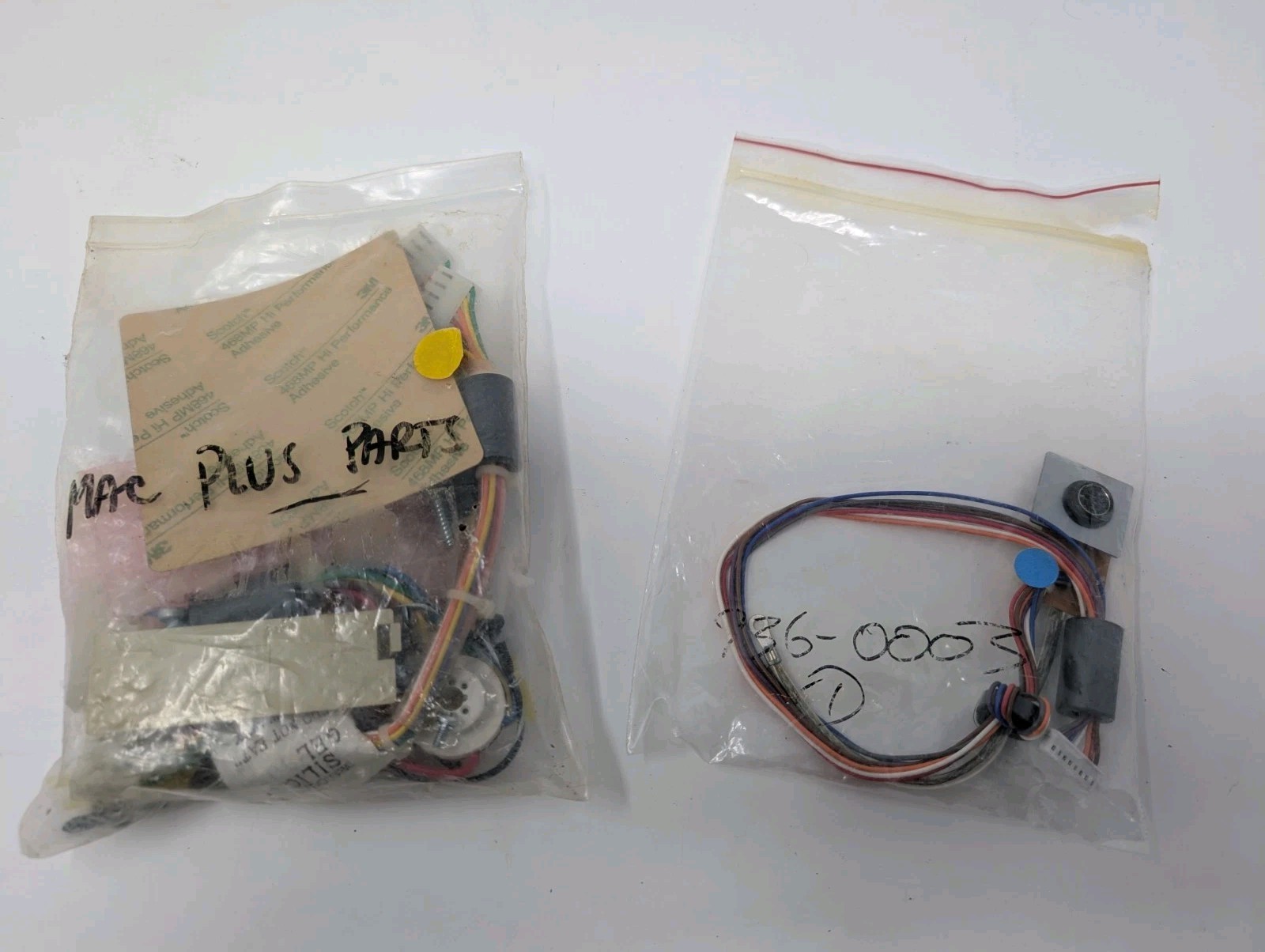 Assorted Mac Plus Parts (Cables, bezels, and whatnot)