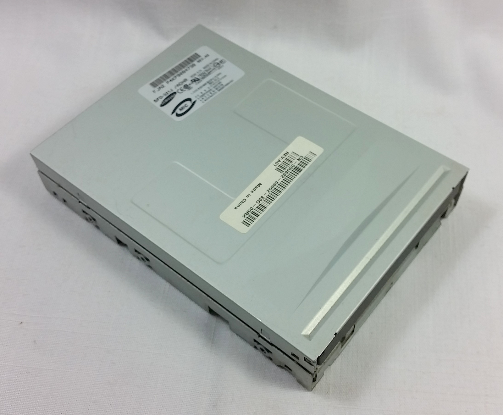 Samsung SFD-321J 3.5" Internal Floppy Drive w/ Black door NO BEZEL CN-05U692