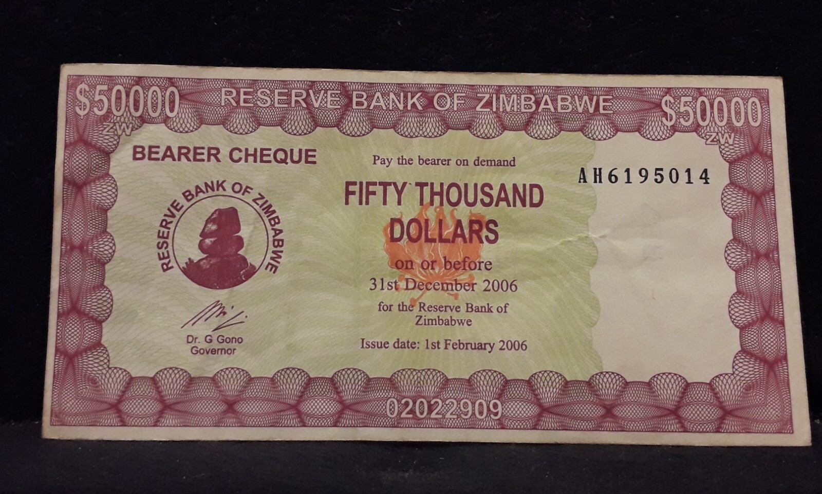 Zimbabwe 2006 50,000 dollars, bearers check, AH serial prefix, P-30 (ZW3)