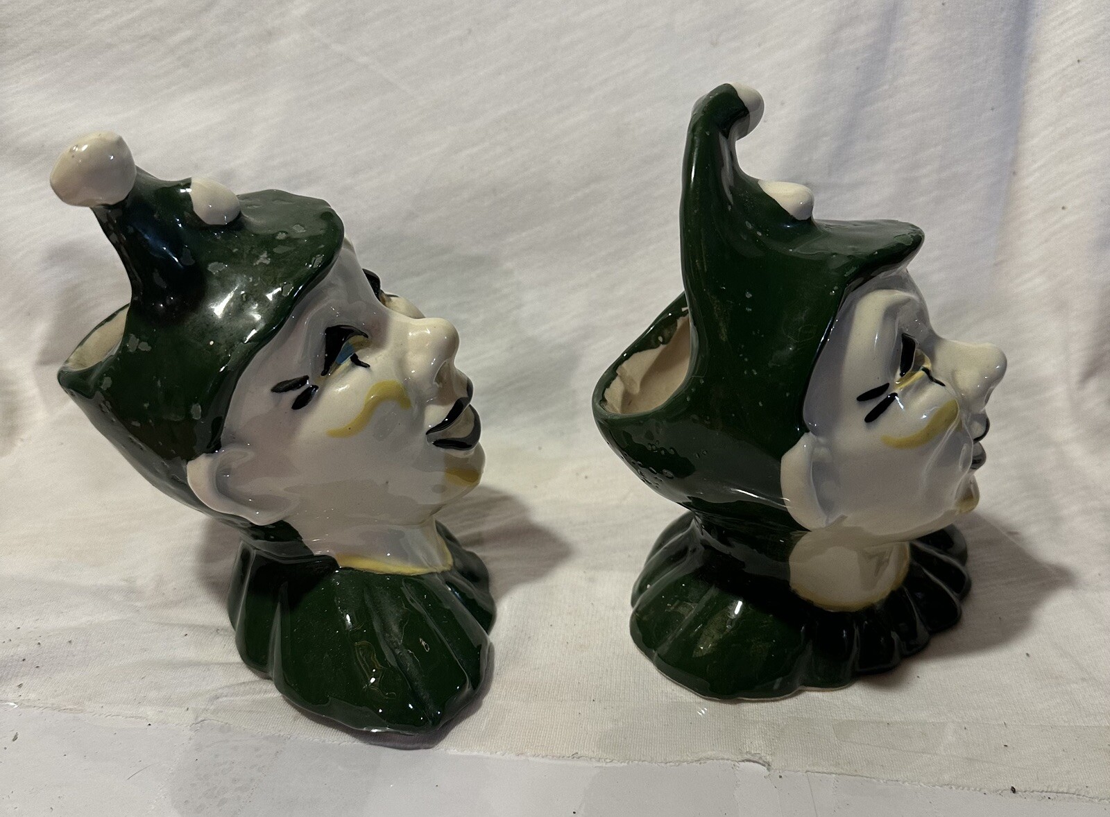 2 ceramic Jester planters.
