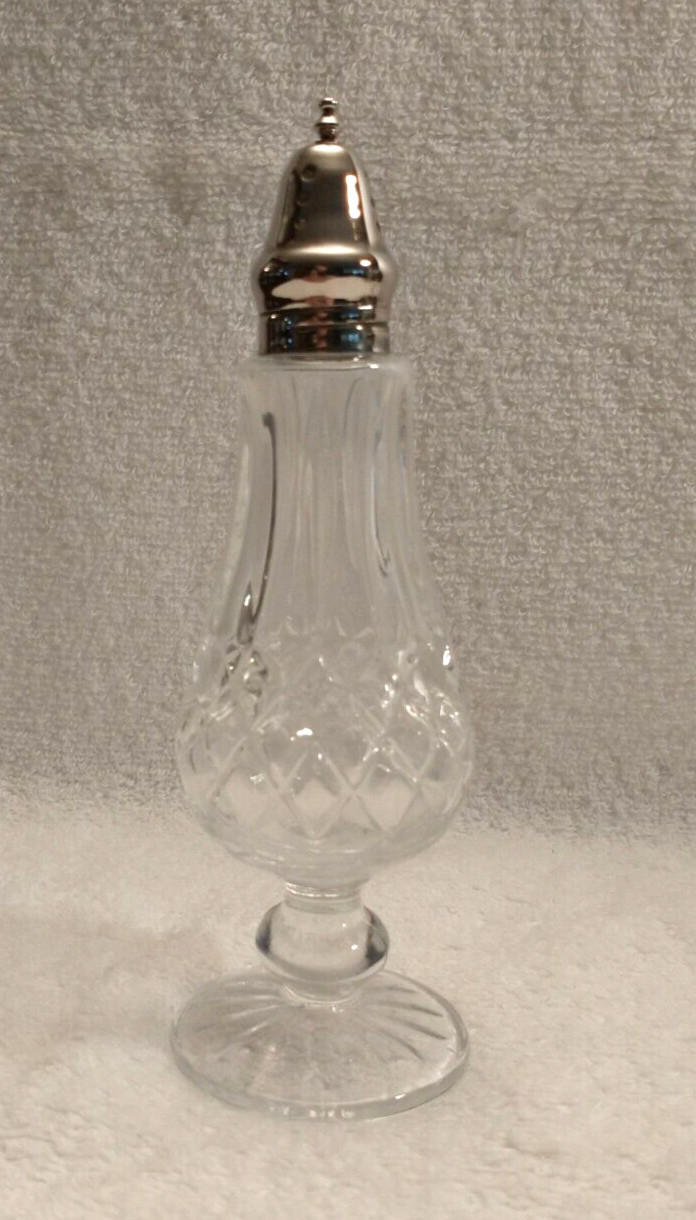 A Pressed Glass Shaker With Chrome Plated Metal Top That Unscrews For Refilling