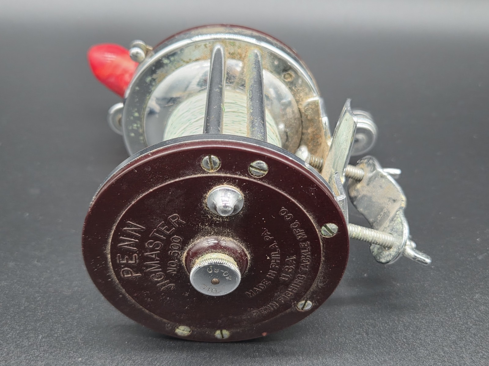 VINTAGE PENN JIGMASTER 500 FISHING REEL WITH STEEL GEARS & GUTS + RED TORPEDO