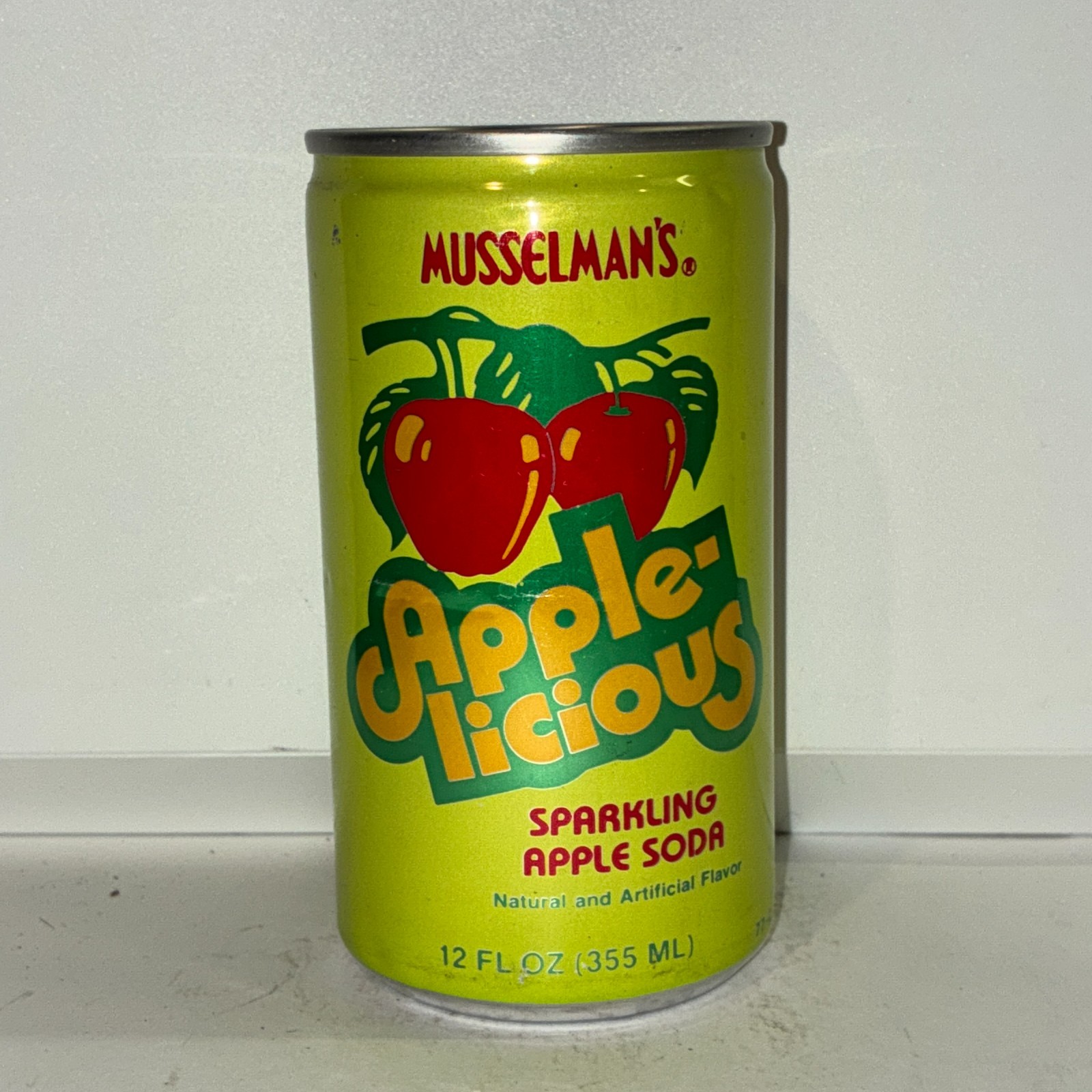 Musselman's Apple-licious Apple soda can, bottom opened