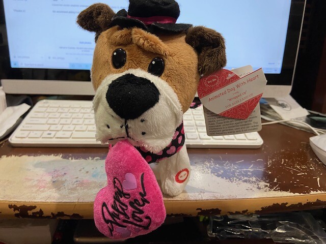 Valentine Animated Dog With Heart I sing "Wrapped Up".