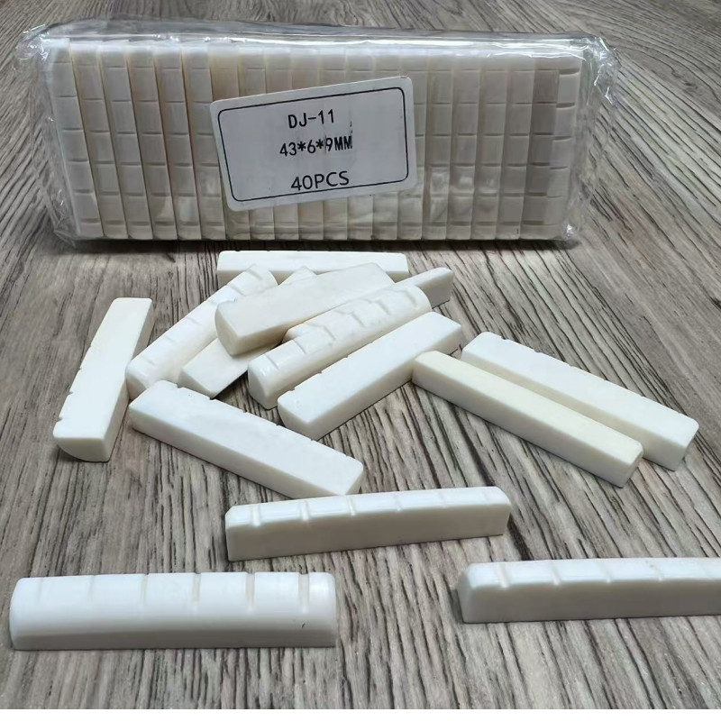 Guitar part:40pieces Acoustic Guitar nuts slotted DJ-11