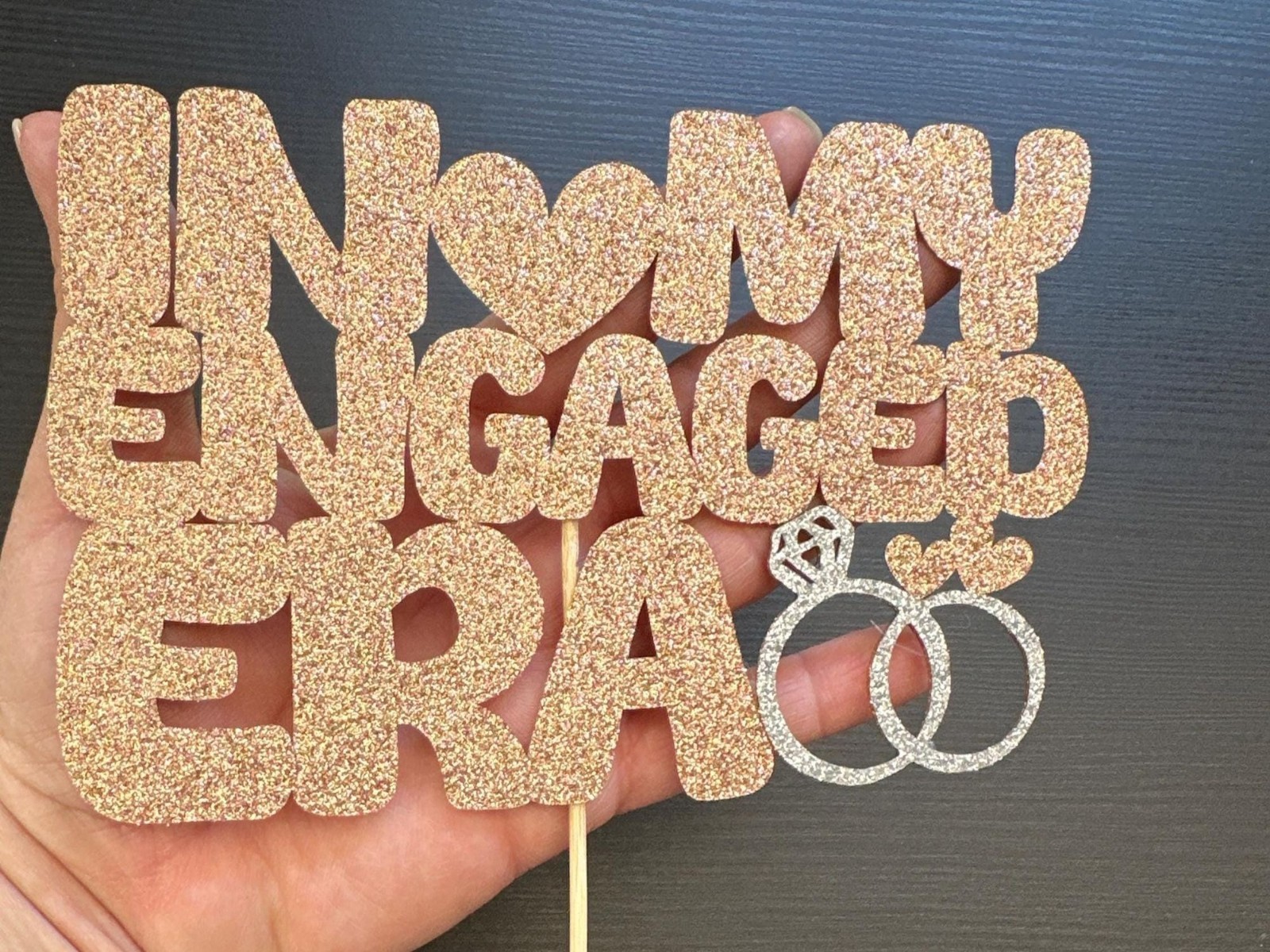 In My Engaged Era Cupcake Topper in rose gold glitter, perfect for bridal shower