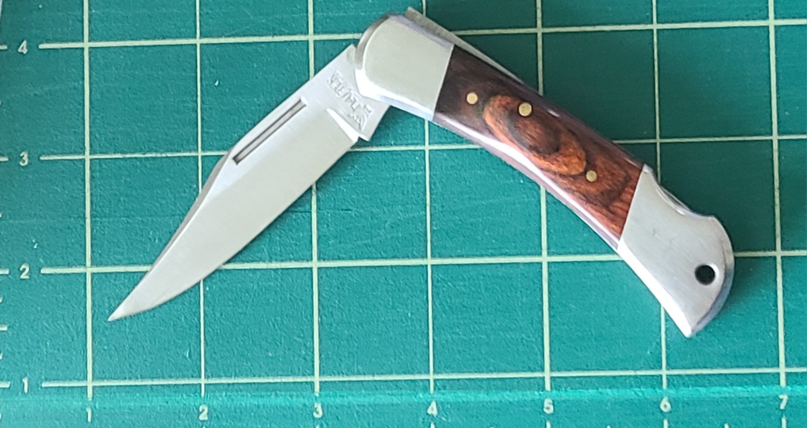 Vintage Master Knives Lockback Folding Pocket Knife-w/multi-toned wooden scales