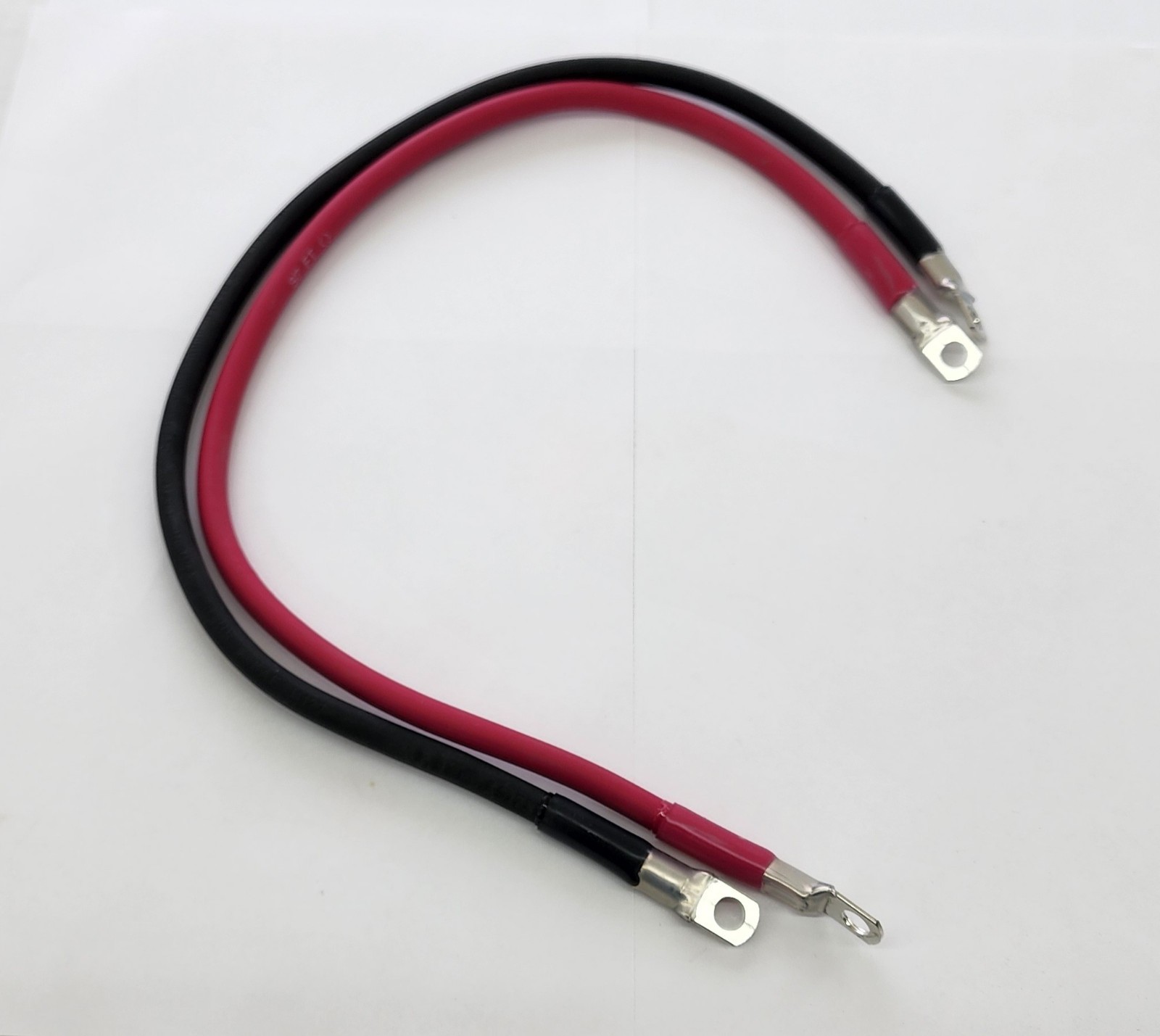 True® Copper Battery Cables #4 AWG 24", with 5/16in. lugs, 2PCS (+&-) Cables.