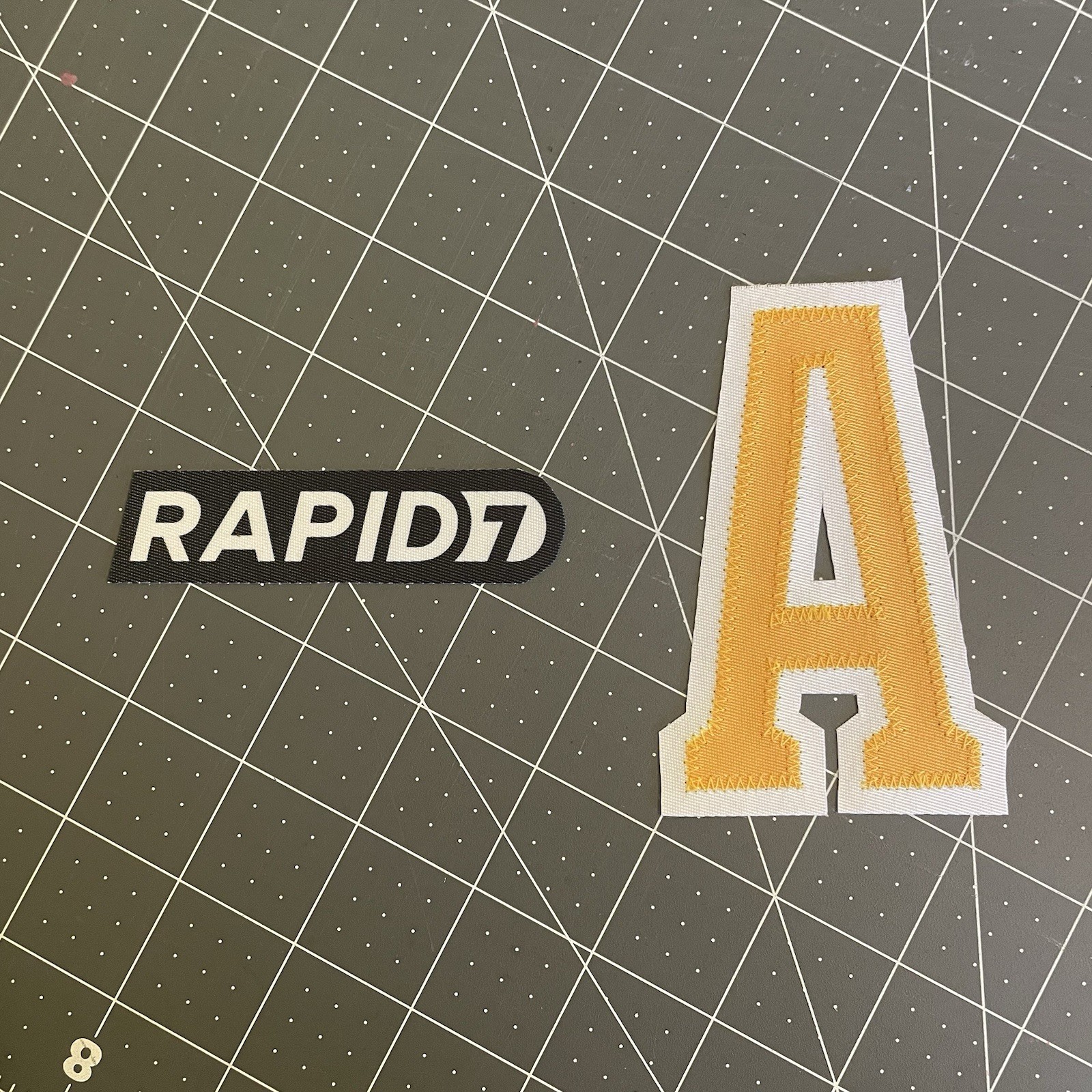 Boston Bruins Rapid7 + Alternate Captain A Fanatics black jersey patch bundle