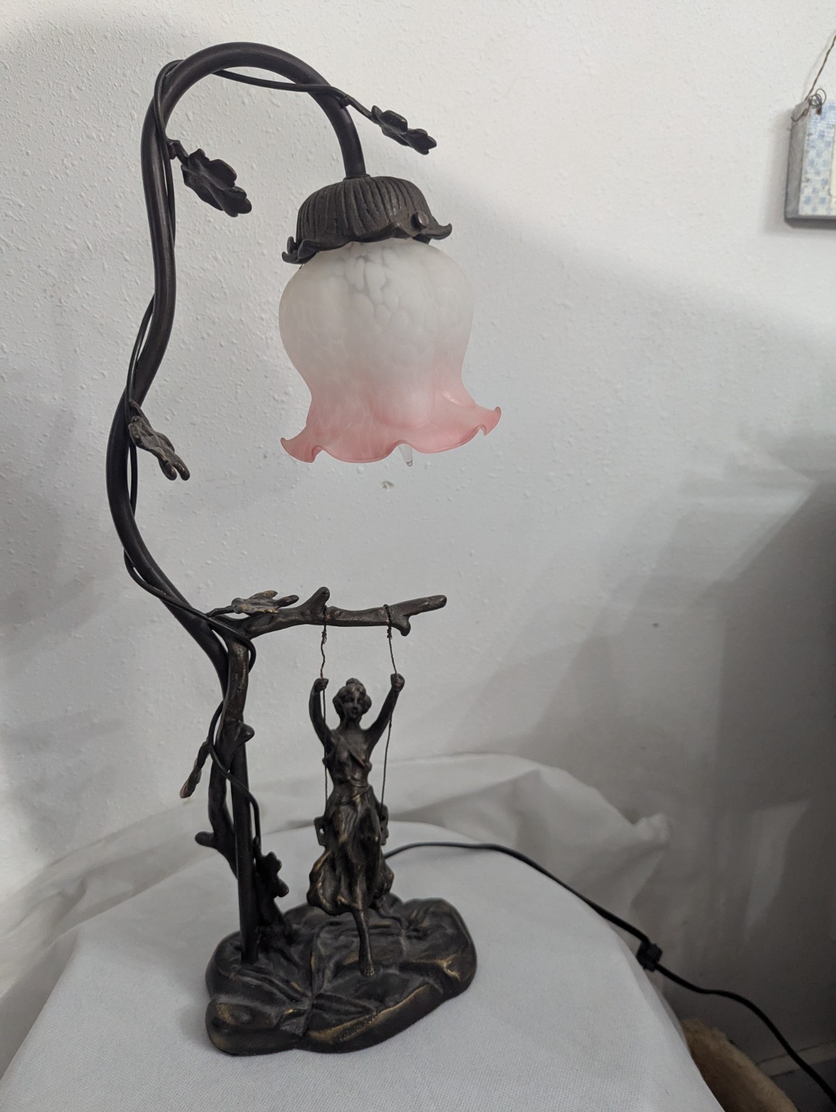 Girl On Swing With Rose Shade Lamp