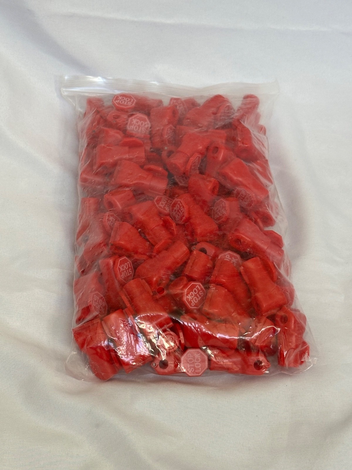 100 pcs Red Stop Lock Peg Hook Locks Plastic for Retail Shop Security Anti Theft