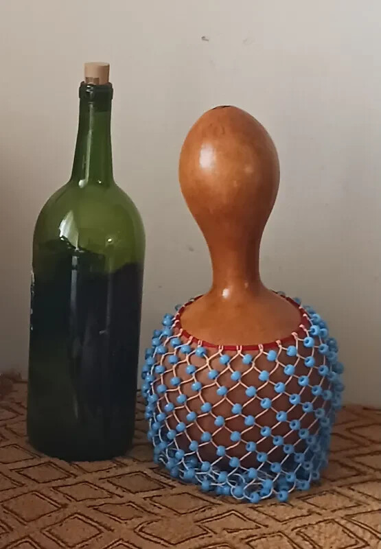 Ghanaian netted gourd rattle (Ewe axatse)