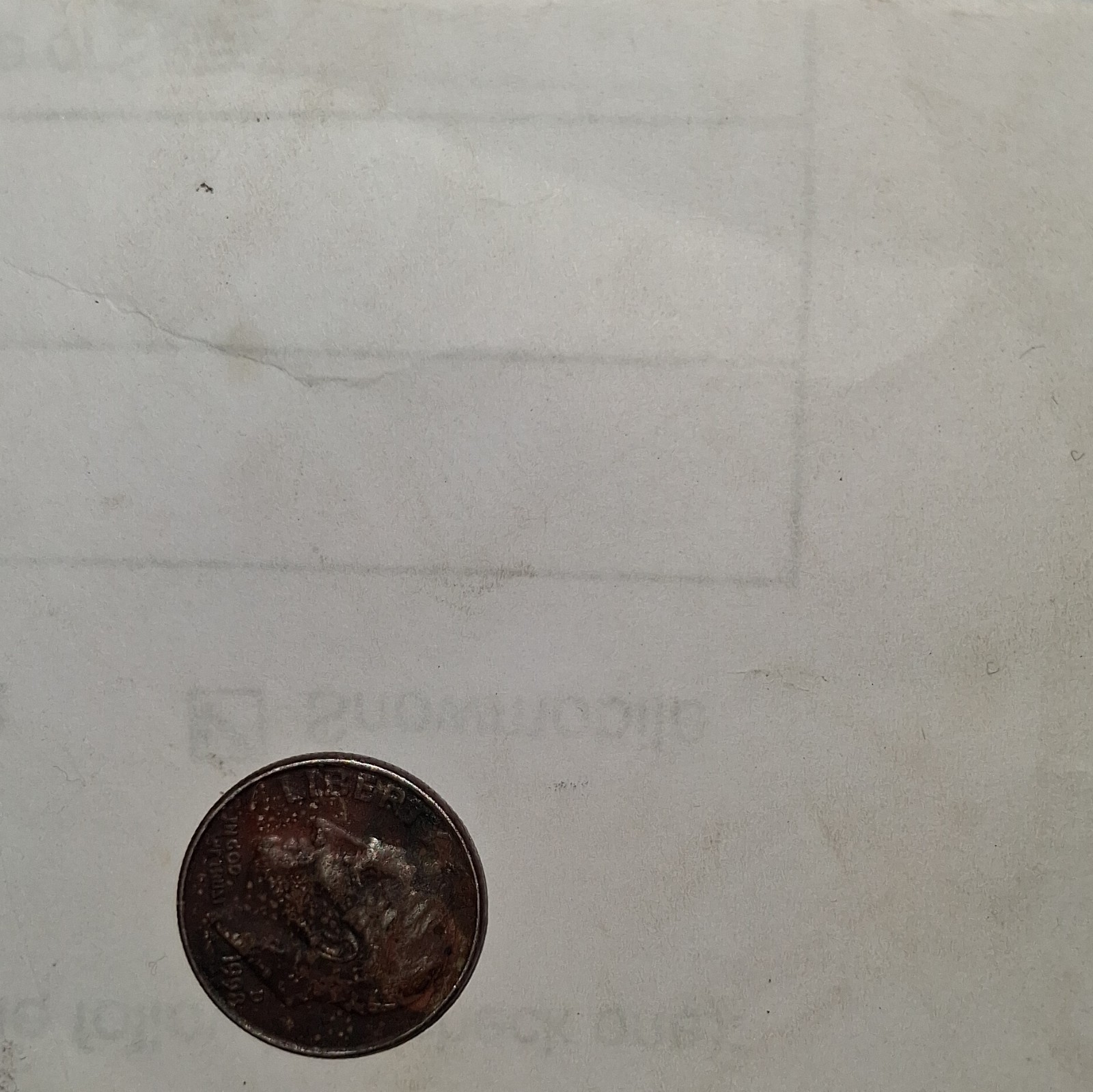 Roosevelt dime, missing clad layer weighs 1.8 grams