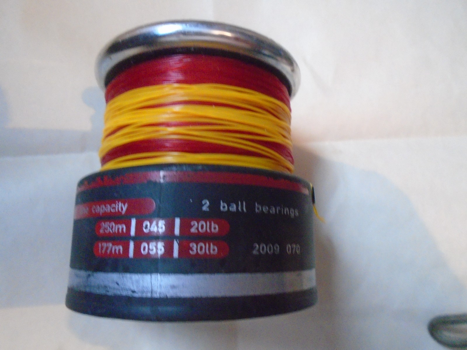 SPARE SPOOL FOR THE SHAKESPEARE ODESSA USED / LINE LOADED