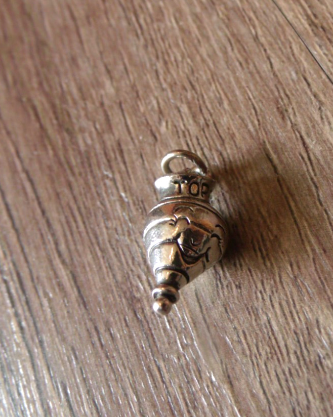 COLLECTIBLE SILVER COLORED TOPS TOY TOP CHARM