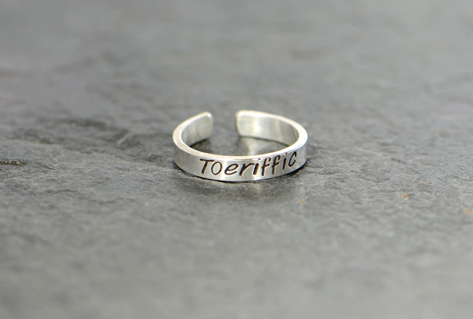Sterling silver toe ring stamped with "toeriffic" for a totally terrific toe