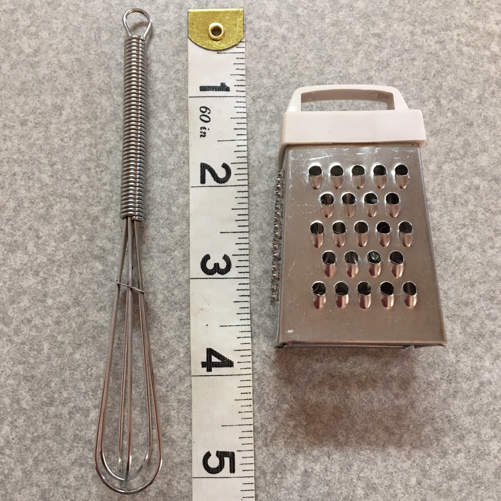 2 Mini Utensils. 4-Sided Grater with Handle & Whisk. Silver-Colored Metal.