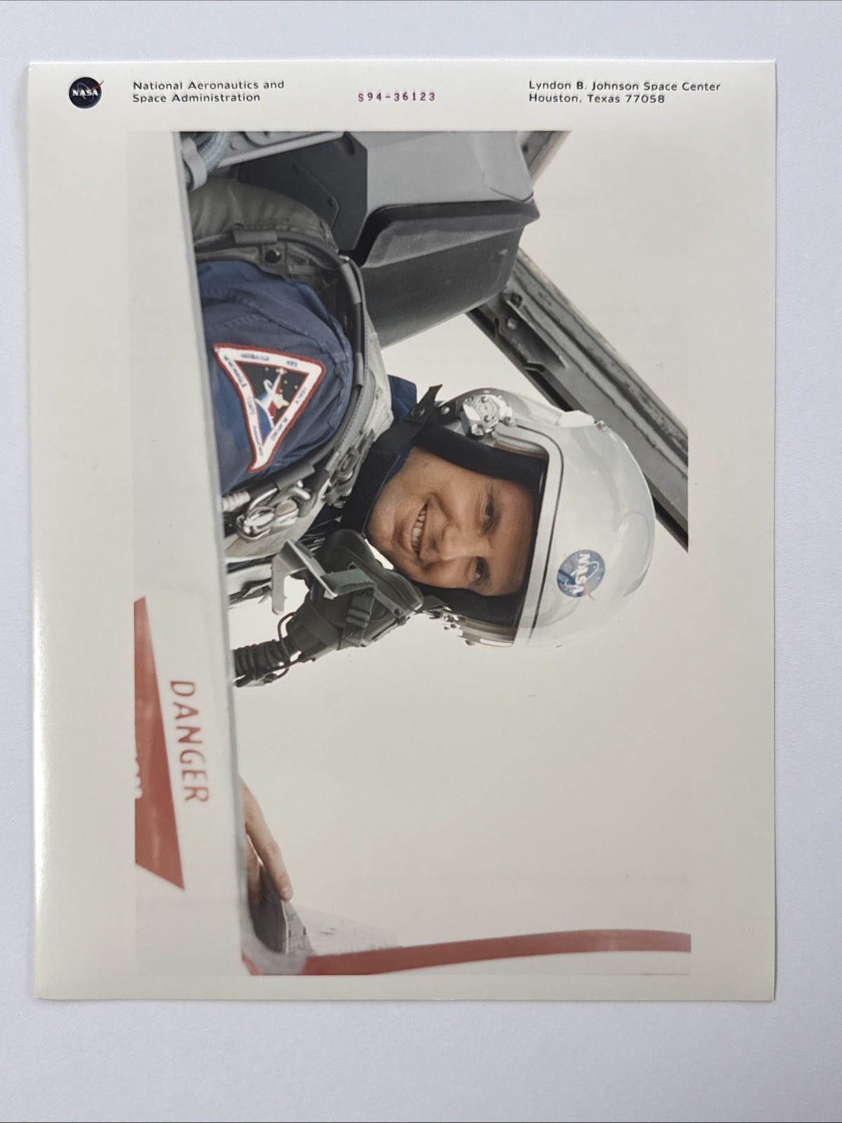 NASA STS 71 Harbaugh Sits in Rear Station of T 38 Purple Numbered Press Photo