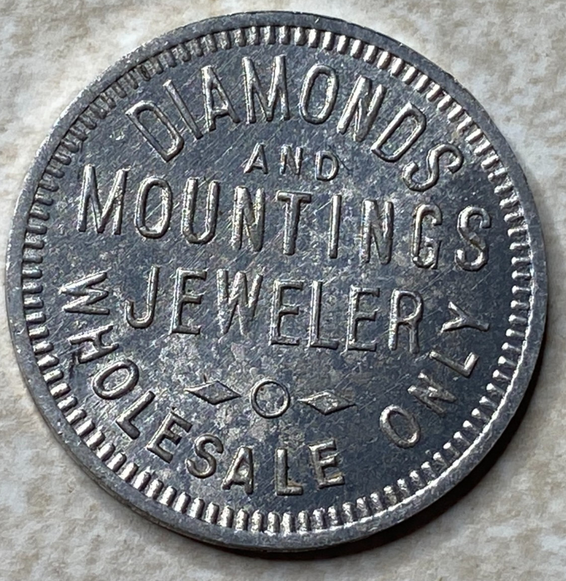 T9138 Diamonds and Mountings Jeweler, Unknown Anillo Restrike Arcade Token