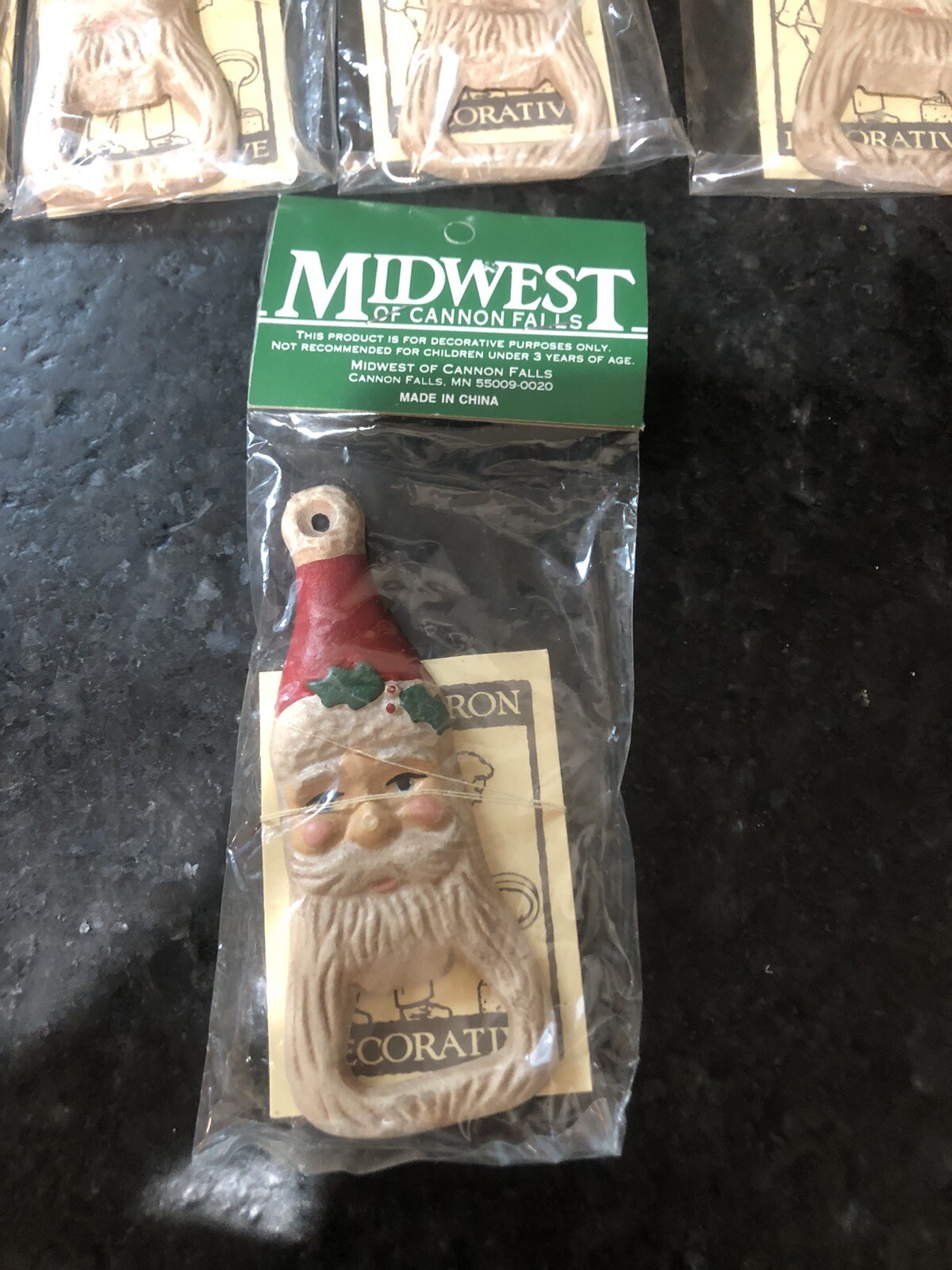 Midwest Importers of Cannon Falls Vintage Santa Cast Iron Bottle Opener 4 5/8 in