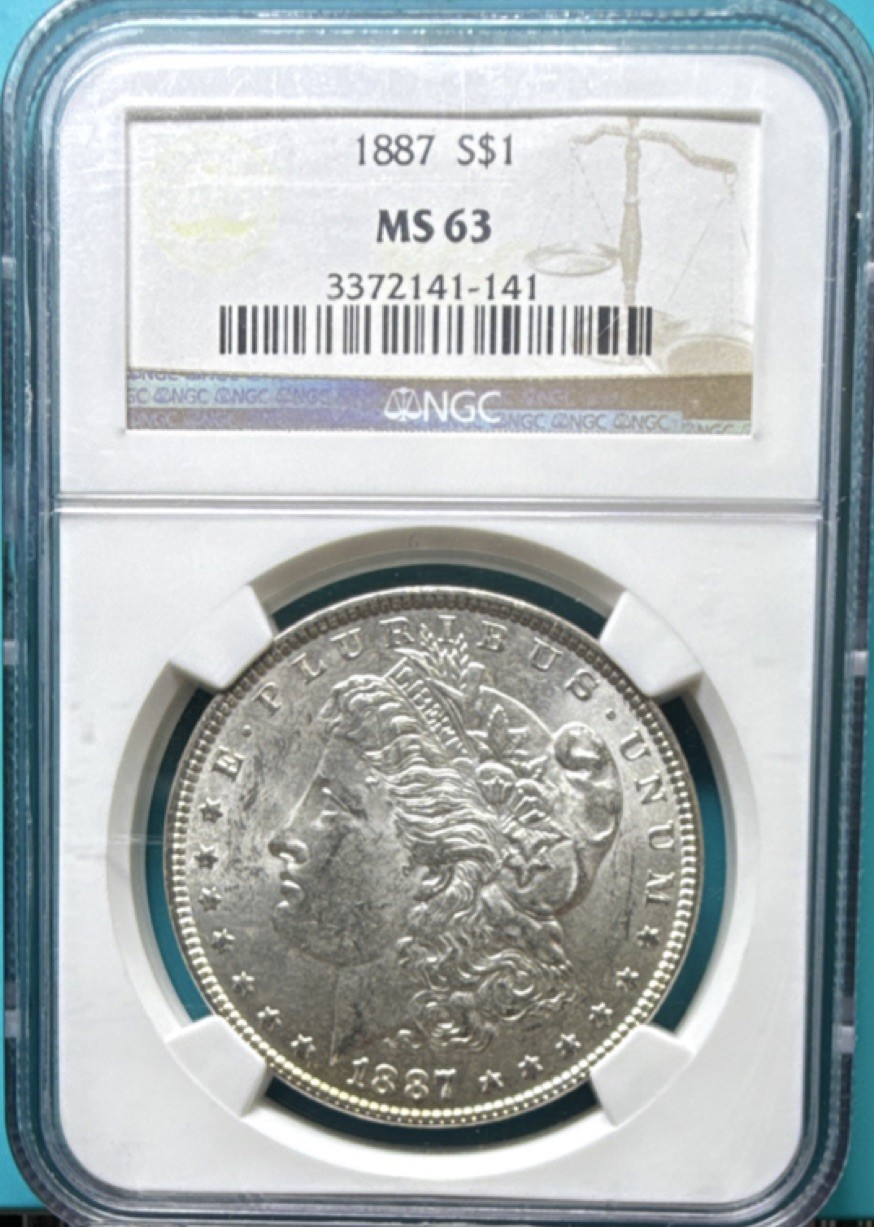 1887-P Morgan Silver Dollar MS63 NGC Certified W/Edge Toning