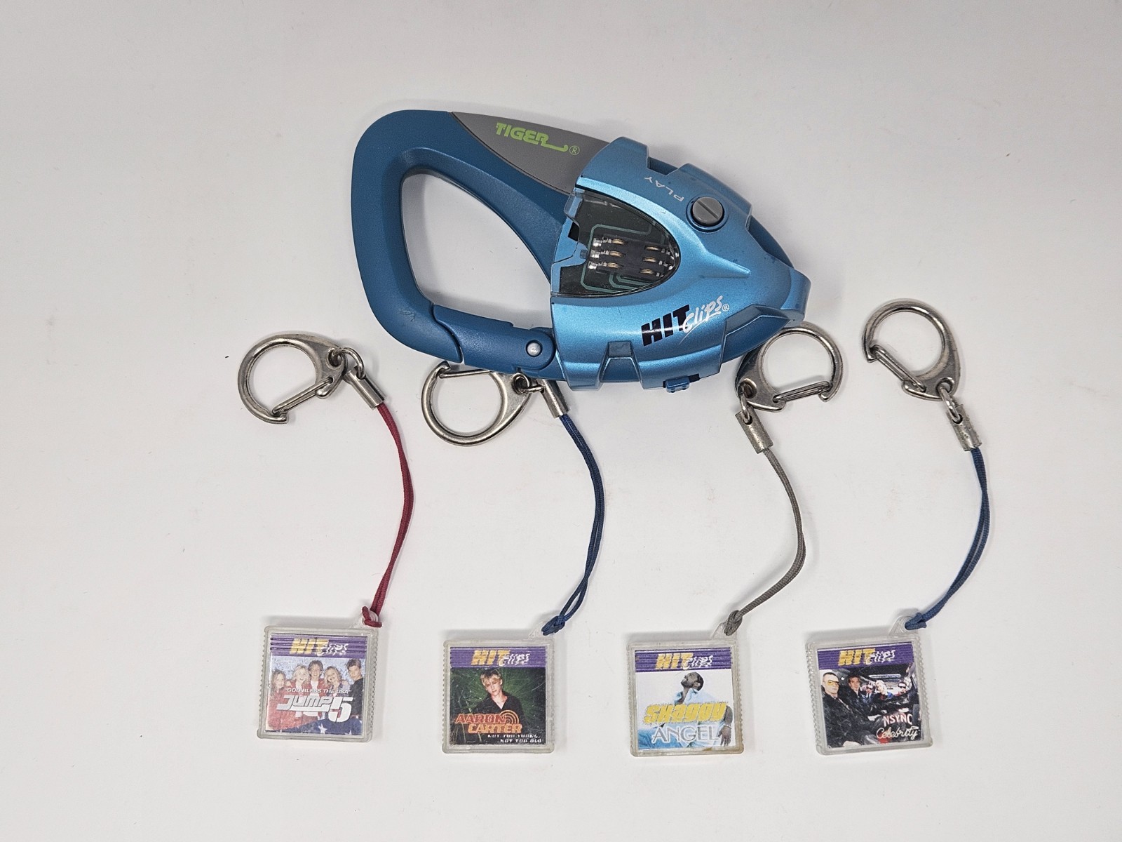 Tiger Electronics Hit Clips Carabiner Style Player With 4 Clips *Untested*