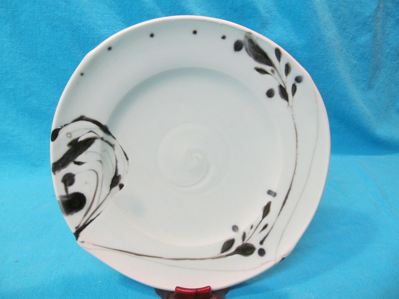 8 1/4" STUDIO POTTERY DISH WITH WEEDS AND SPIRAL SWIRL PATTERN