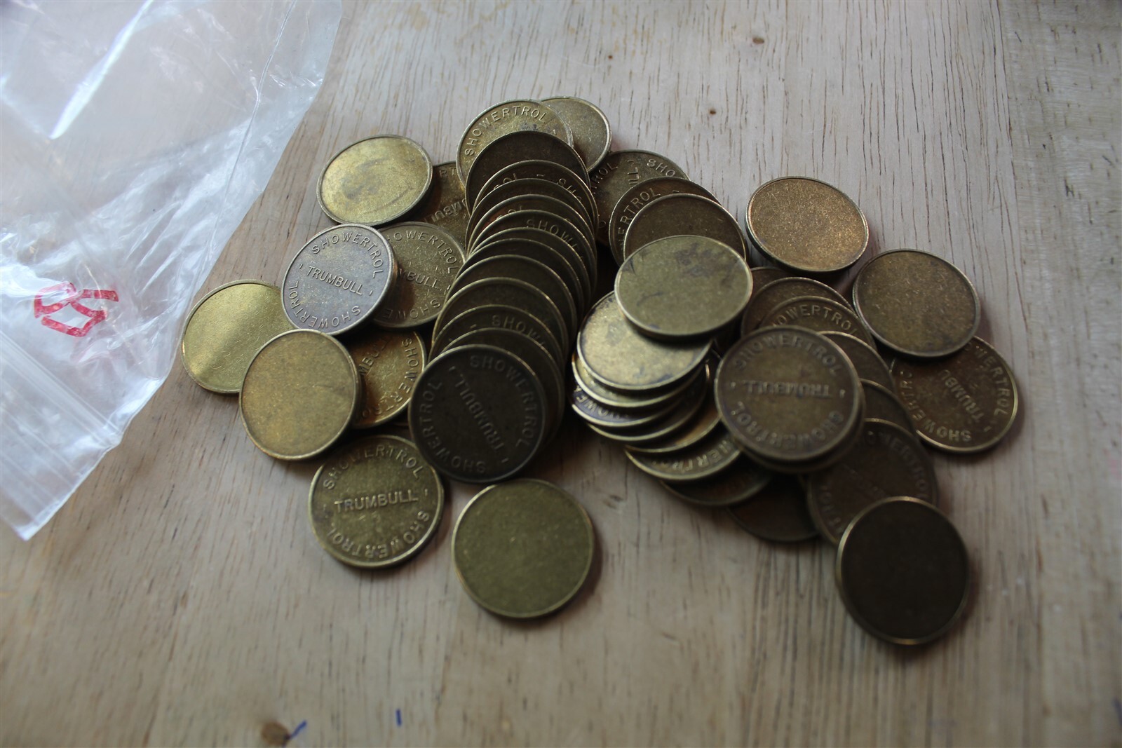 SHOWERTROL TRUMBELL TOKEN - LOT OF 50 TOKENS - BLANK BACK (UNIFACE)