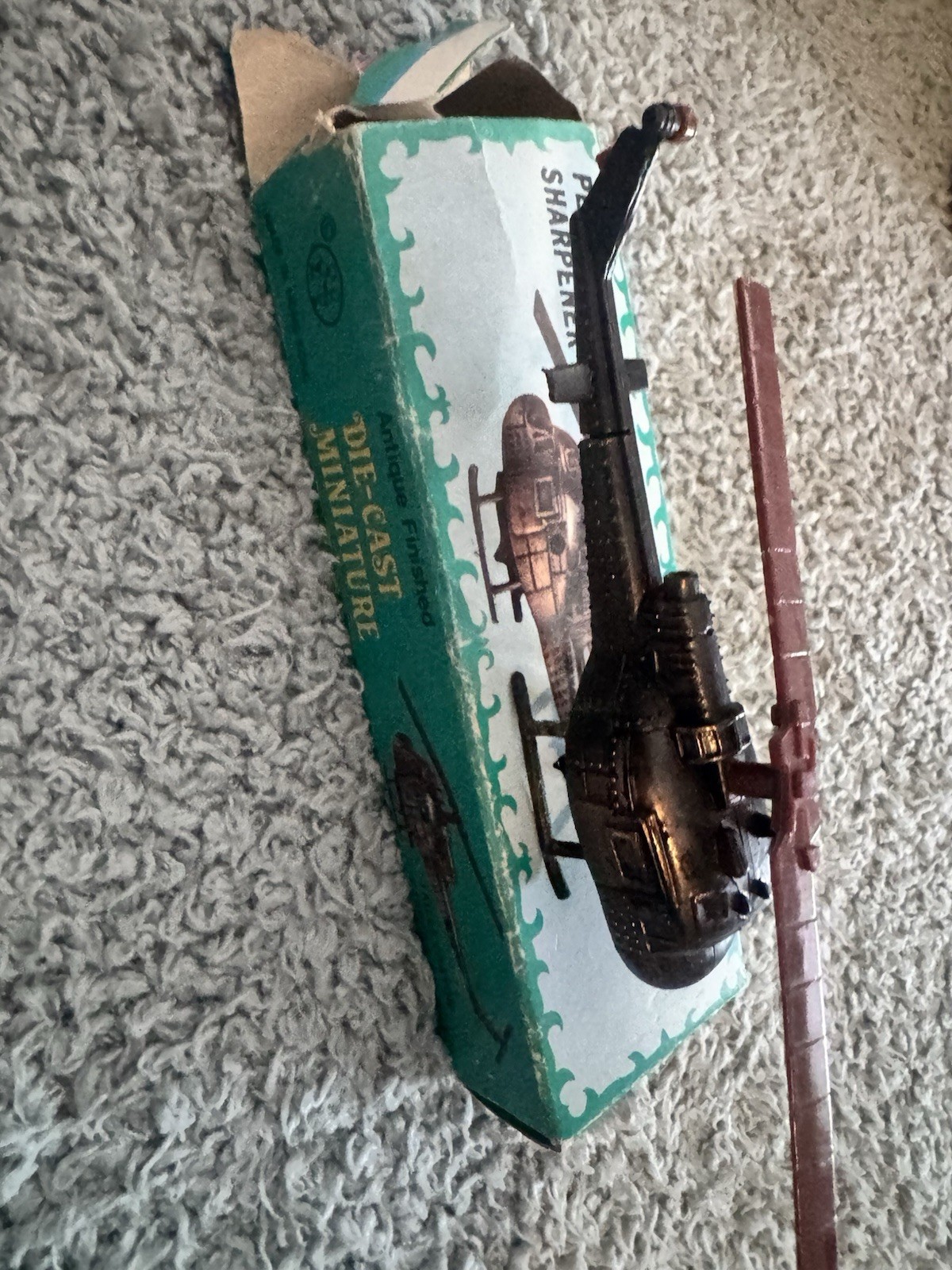 Die Cast metal replica of a Bell military helicopter collectible pencil sharpene