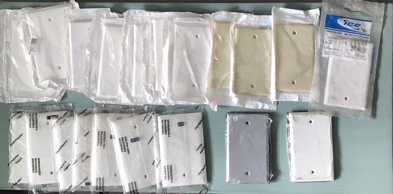 VARIETY OF BLANK SINGLE-GANG PLATES (ICC,LEVITON,BELL,ETC) LOT OF 20 - NEW
